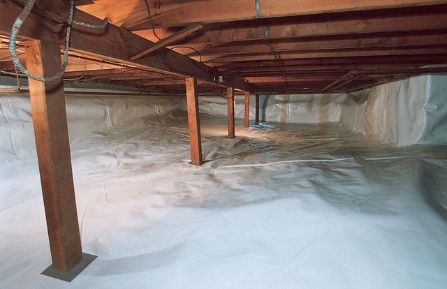 Encapsulated basement with sealed liner around the support posts